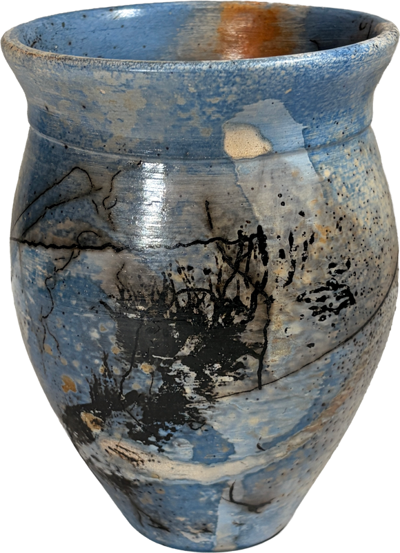 A handmade ceramic vase with a blue, gray, and black abstract glaze pattern on a white background.