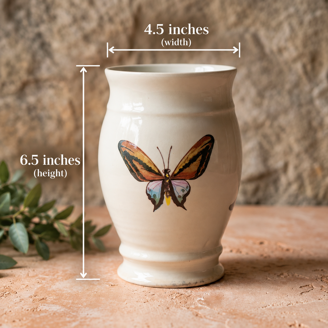 A cream-colored ceramic vase with a painted butterfly on the front, shown with white dimension lines indicating a width of 4.5 inches and a height of 6.