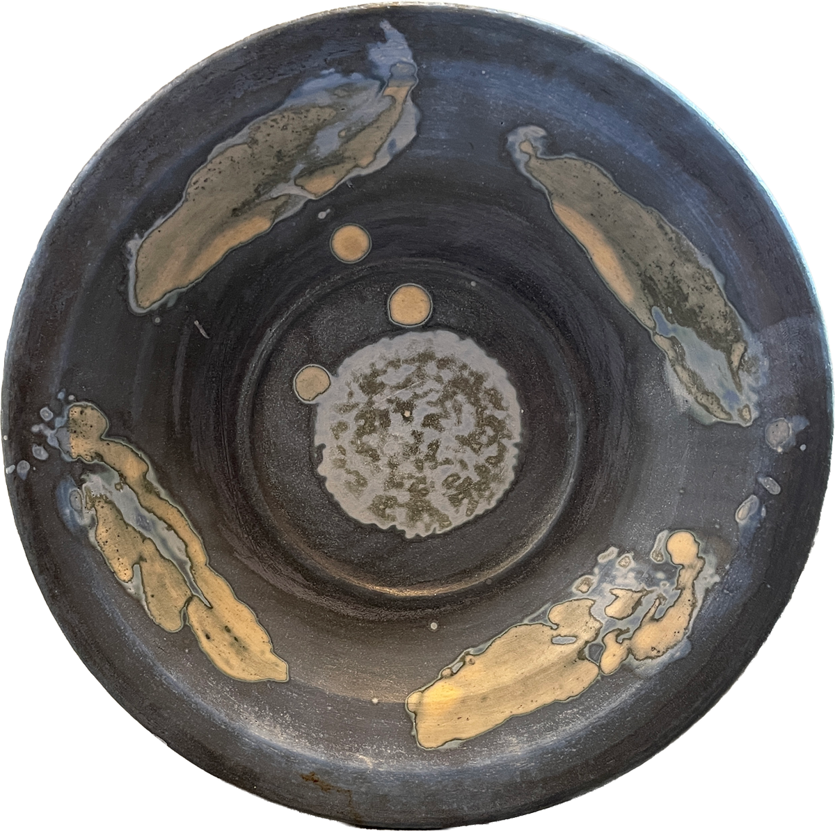 A round ceramic bowl with a dark charcoal gray exterior and a textured, speckled off-white interior, decorated with four irregular metallic gold leaf accents on the outer surface.