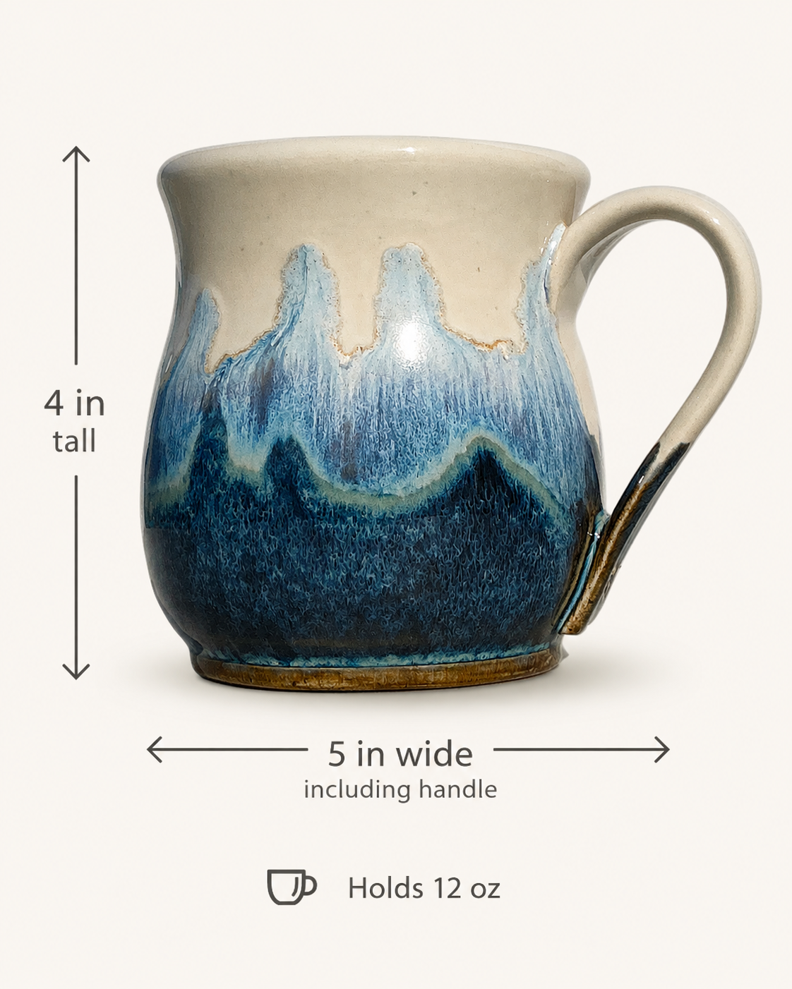 A ceramic mug with a cream-colored upper body and a blue and white wave-like glaze pattern on the lower half, shown with dimension arrows indicating it is 4 inches tall, 5 inches wide including the handle, and holds 12 oz.